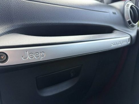 Used 2013 Jeep Wrangler Unlimited Sahara w/ Dual Top Group AWD/4WD image 16
