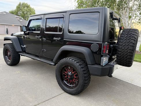 Used 2012 Jeep Wrangler Unlimited Sport w/ Black Appearance Group AWD/4WD image 8