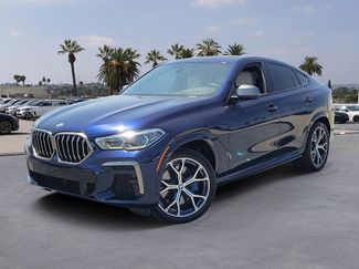 Used 2023 BMW X6 M50i w/ Executive Package AWD/4WD video 1