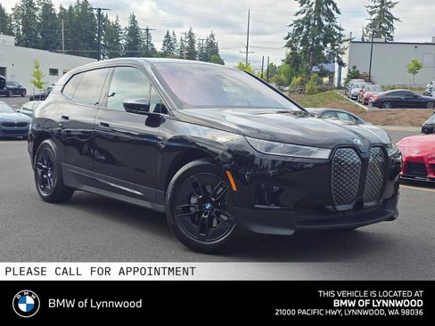 Used 2024 BMW iX xDrive50 w/ Premium Package AWD/4WD image 1