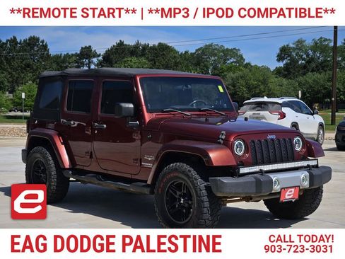 Used 2010 Jeep Wrangler Unlimited Sahara w/ Dual Top Group AWD/4WD image 1