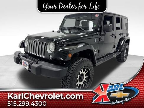 Used 2016 Jeep Wrangler Unlimited Sahara image 1