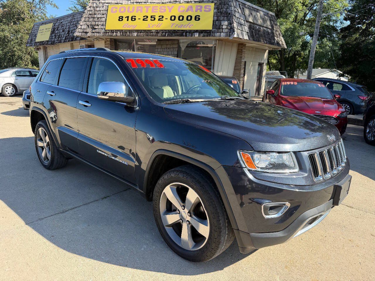 Used 2014 Jeep Grand Cherokee Limited AWD/4WD image 1