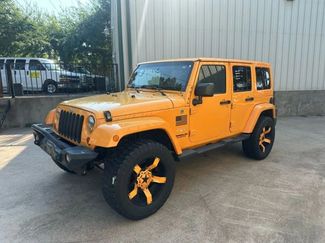 Used 2012 Jeep Wrangler Unlimited Sahara w/ Dual Top Group image 1
