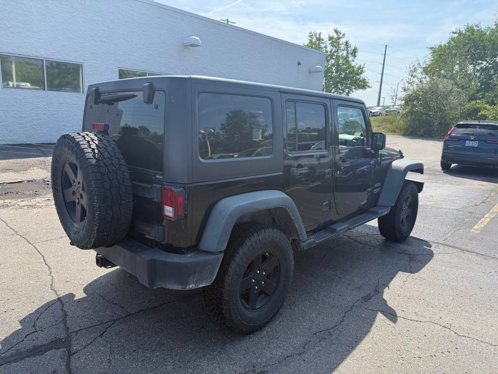 Used 2011 Jeep Wrangler Unlimited Sport w/ Trailer Tow Group AWD/4WD image 3