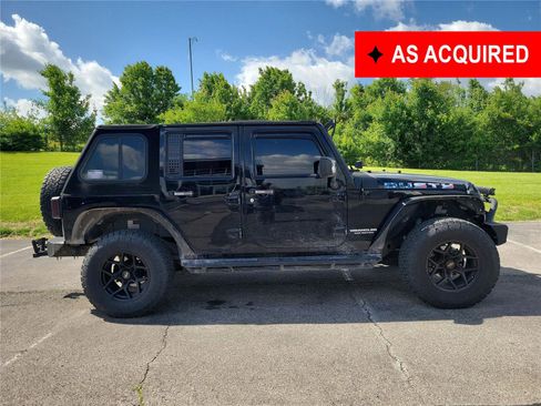 Used 2013 Jeep Wrangler Unlimited Sport AWD/4WD image 1