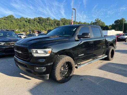 Used 2023 RAM 1500 Laramie AWD/4WD image 1