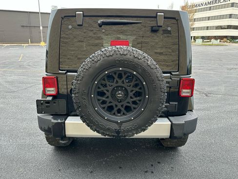 Used 2014 Jeep Wrangler Unlimited Sahara w/ Dual Top Group image 4