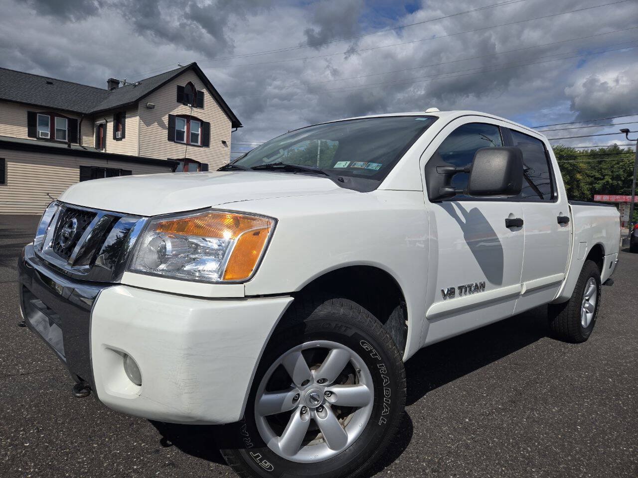 Used 2012 Nissan Titan SV w/ SV Premium Utility Pkg AWD/4WD image 2