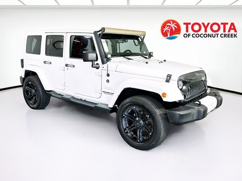 Used 2014 Jeep Wrangler Unlimited Sahara w/ Connectivity Group image 1