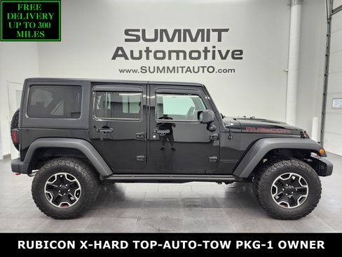 Used 2014 Jeep Wrangler Unlimited Rubicon AWD/4WD image 1