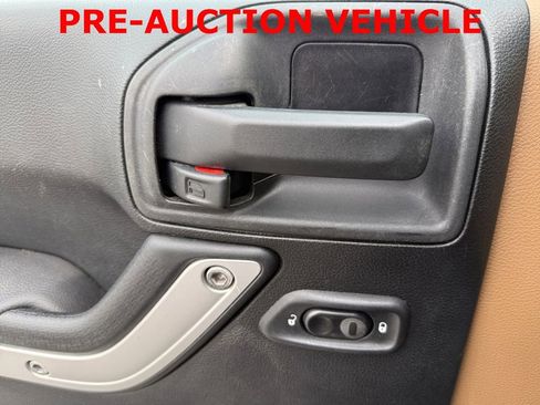 Used 2014 Jeep Wrangler Unlimited Sahara w/ Max Tow Package image 24