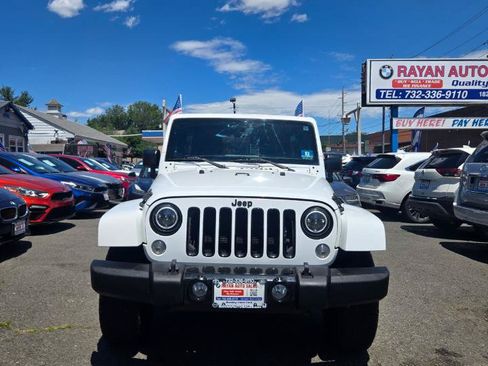 Used 2014 Jeep Wrangler Unlimited Sahara AWD/4WD image 14
