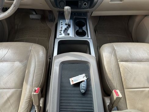 Used 2011 Nissan Armada Platinum w/ 2nd Row Captain Seat Pkg image 24