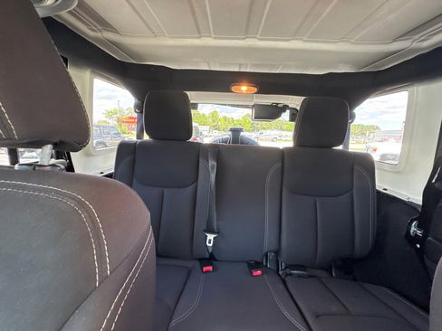 Used 2013 Jeep Wrangler Unlimited Sahara w/ Mopar Chrome Edition Group AWD/4WD image 17