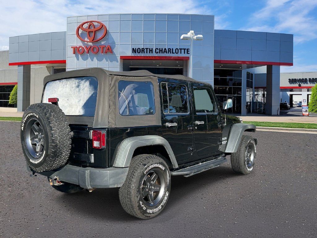 Used 2011 Jeep Wrangler Unlimited Sport w/ Trailer Tow Group AWD/4WD image 7