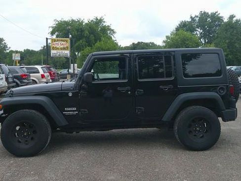 Used 2013 Jeep Wrangler Unlimited Sport AWD/4WD image 1