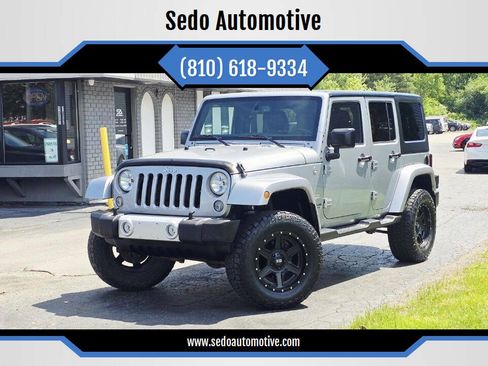 Used 2015 Jeep Wrangler Unlimited Sahara w/ Connectivity Group AWD/4WD image 1