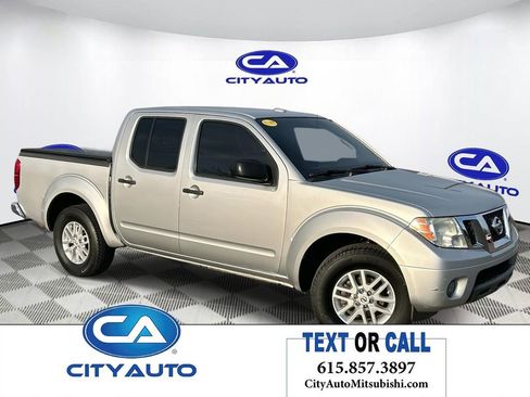 Used 2014 Nissan Frontier SV image 1