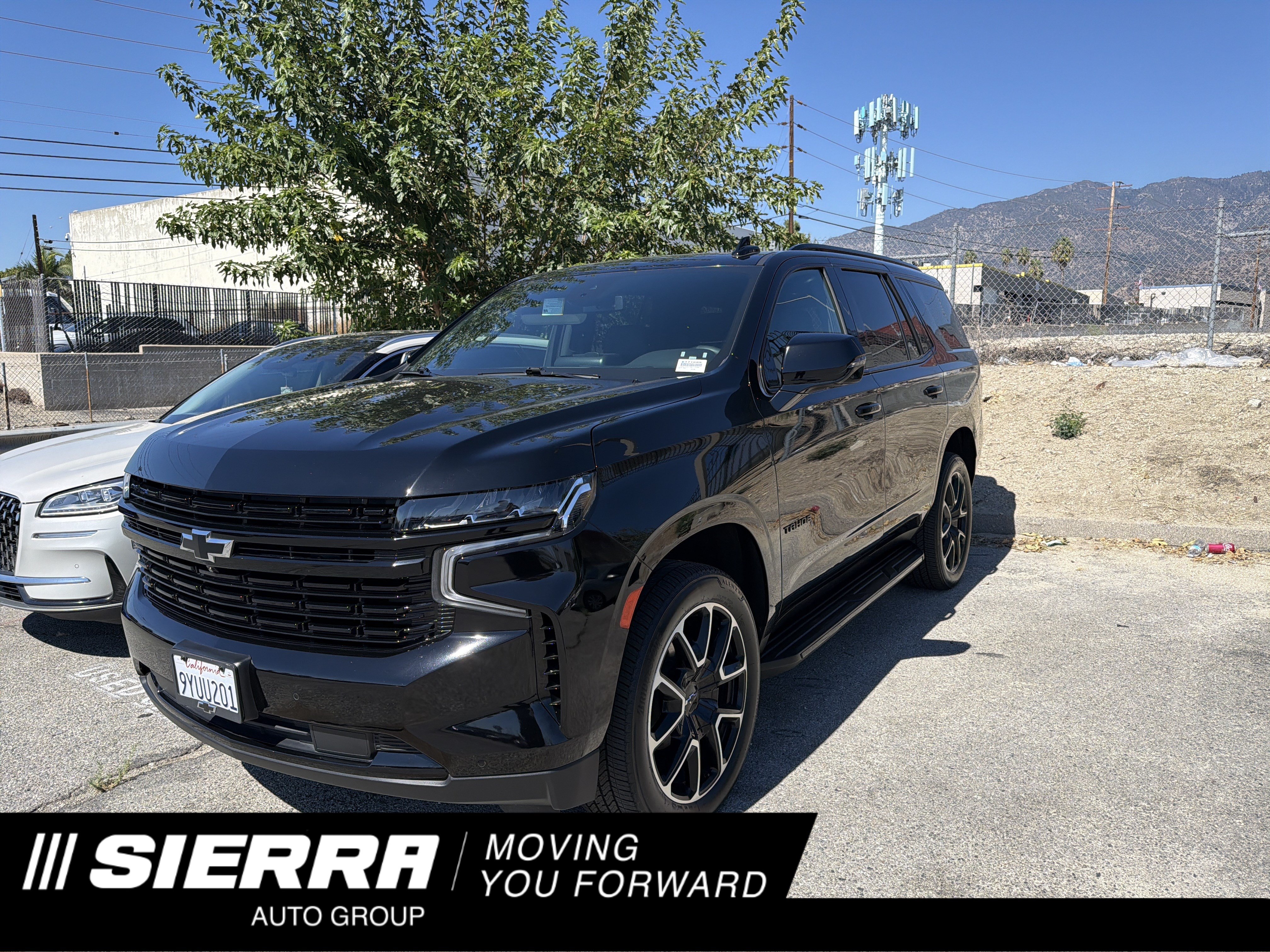 Used 2024 Chevrolet Tahoe RST w/ Luxury Package AWD/4WD image 1