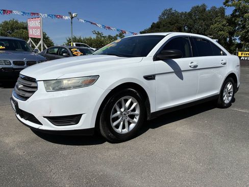 Used 2014 Ford Taurus SE FWD image 1