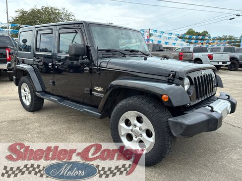 Used 2015 Jeep Wrangler Unlimited Sahara w/ Connectivity Group AWD/4WD image 1