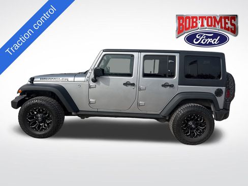 Used 2016 Jeep Wrangler Unlimited Sport image 1