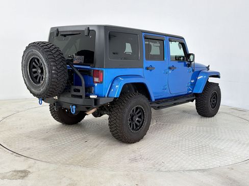 Used 2015 Jeep Wrangler Unlimited Sahara w/ Max Tow Package image 9