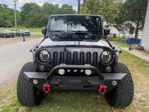 Used 2012 Jeep Wrangler Unlimited Sahara w/ Dual Top Group AWD/4WD image 6