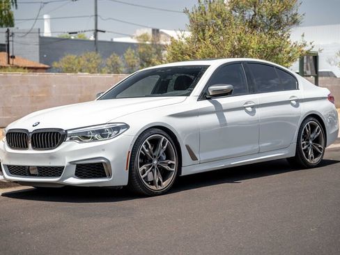 Used 2020 BMW M550i xDrive w/ Executive Package AWD/4WD image 1