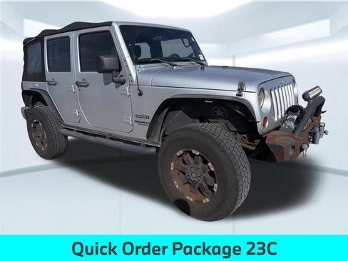 Used 2012 Jeep Wrangler Unlimited Sport AWD/4WD image 2