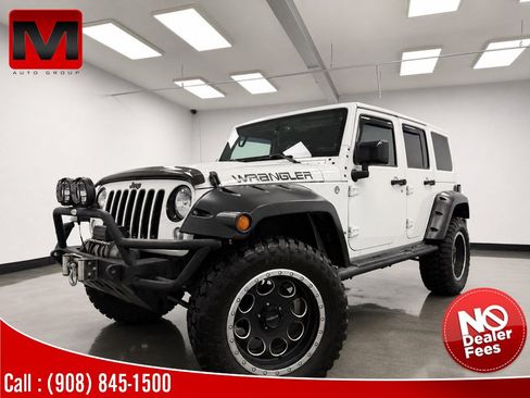 Used 2015 Jeep Wrangler Unlimited Sahara AWD/4WD image 1