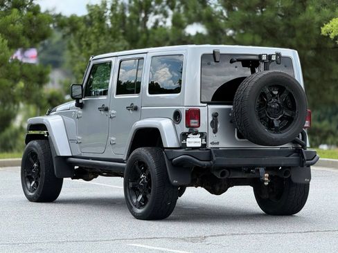 Used 2014 Jeep Wrangler Unlimited Rubicon w/ Dual Top Group AWD/4WD image 10