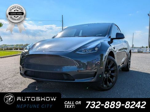 Used 2024 Tesla Model Y Long Range AWD/4WD image 1