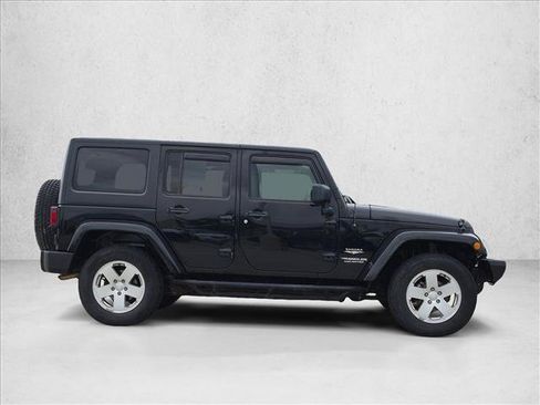 Used 2011 Jeep Wrangler Unlimited Sahara w/ Dual Top Group AWD/4WD image 4