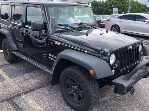 Used 2015 Jeep Wrangler Unlimited Sport w/ Mopar Black Appearance Group image 6