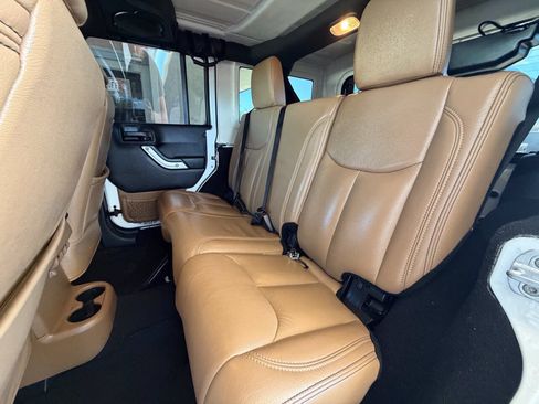 Used 2013 Jeep Wrangler Unlimited Sahara w/ Dual Top Group AWD/4WD image 14