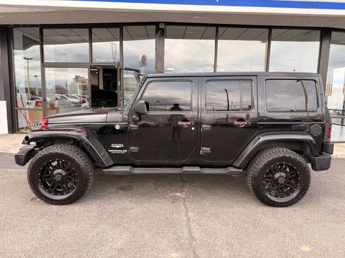 Used 2011 Jeep Wrangler Unlimited Sahara w/ Dual Top Group image 2