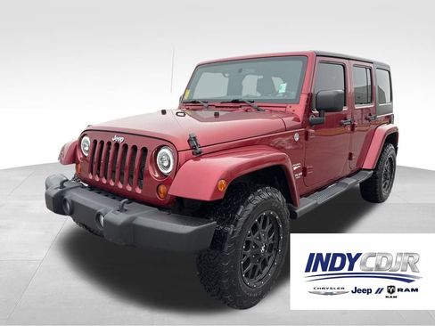 Used 2012 Jeep Wrangler Unlimited Sahara w/ Dual Top Group image 1