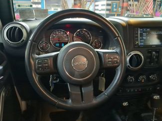 Used 2016 Jeep Wrangler Unlimited Sahara w/ Dual Top Group AWD/4WD video 2