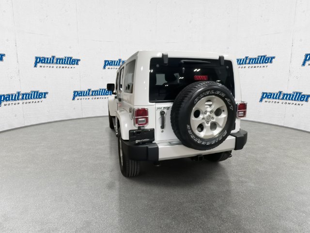 Used 2014 Jeep Wrangler Unlimited Sahara w/ Mopar Chrome Edition Group AWD/4WD image 9