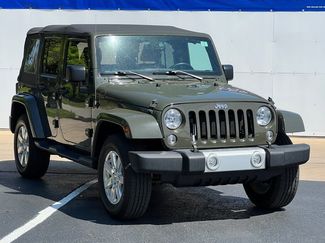 Used 2015 Jeep Wrangler Unlimited Sahara w/ Max Tow Package AWD/4WD video 1