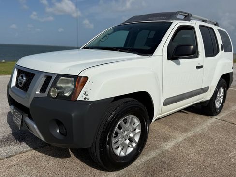 Used 2014 Nissan Xterra S RWD image 1