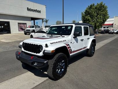 New 2026 Jeep Wrangler Unlimited Sport w/ Dual Top Group
