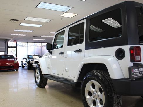 Used 2013 Jeep Wrangler Unlimited Sahara w/ Connectivity Group AWD/4WD image 19