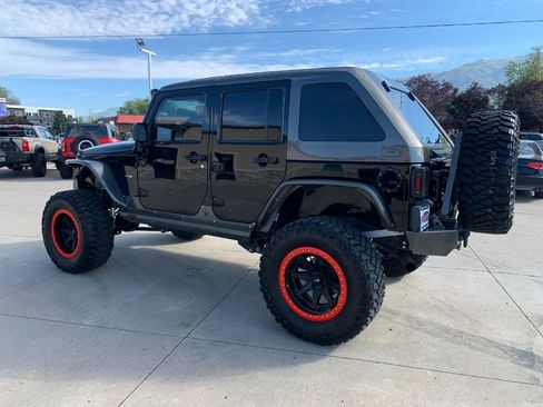 Used 2010 Jeep Wrangler Unlimited Rubicon w/ Dual Top Group image 4