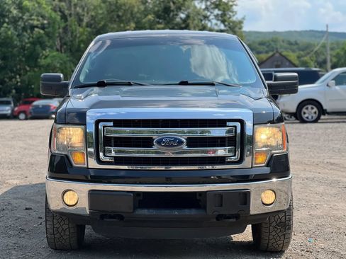 Used 2014 Ford F150 XLT AWD/4WD image 1