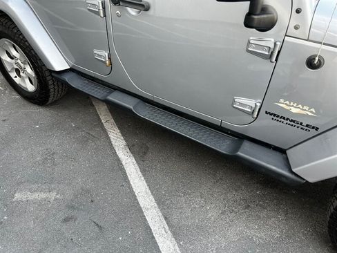 Used 2015 Jeep Wrangler Unlimited Sahara w/ Dual Top Group AWD/4WD image 9