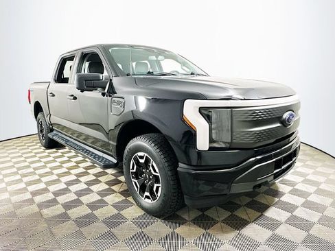 Used 2023 Ford F150 Lightning XLT AWD/4WD image 1