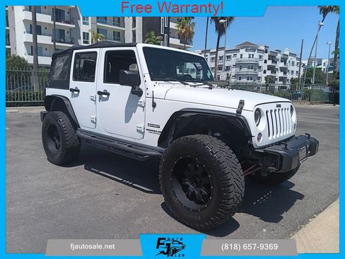 Used 2014 Jeep Wrangler Unlimited Sport AWD/4WD image 1